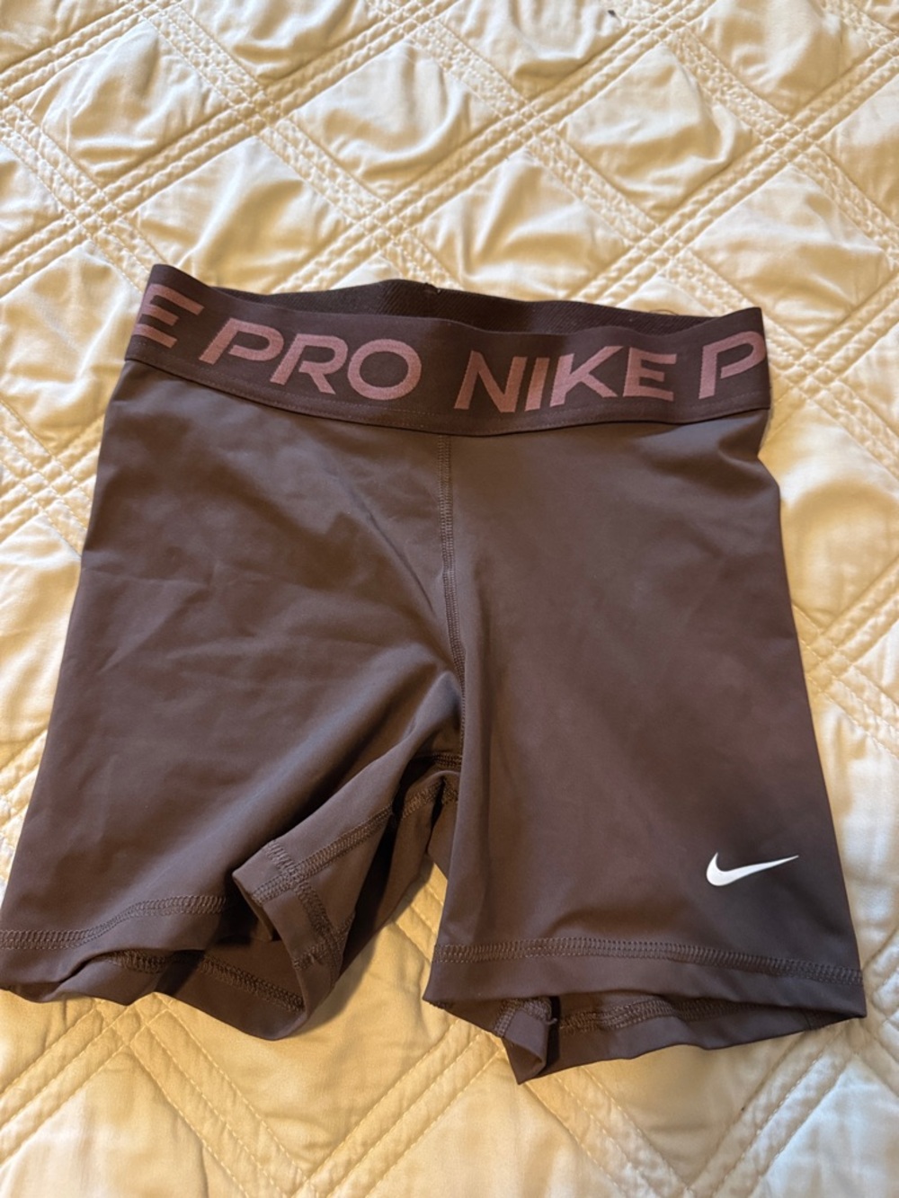 Nike Pro Women's Chocolate Brown Bike Shorts with Pink Logo Waistband